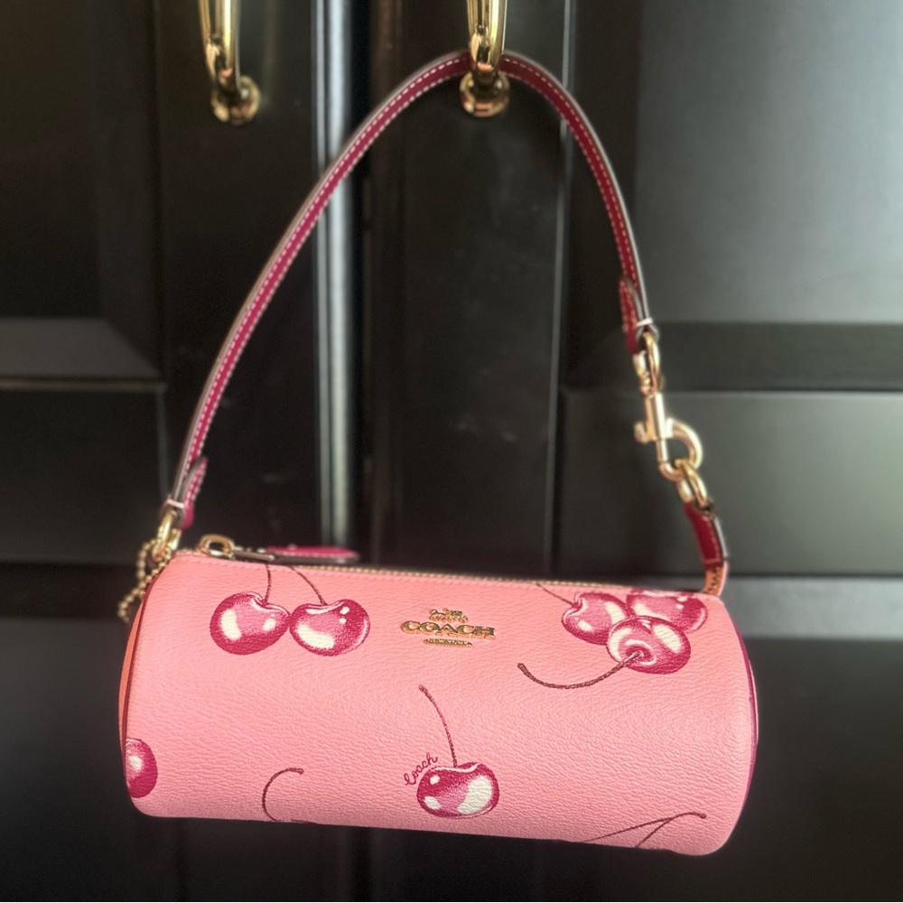 Coach Pink Clutch with Gold Accents
